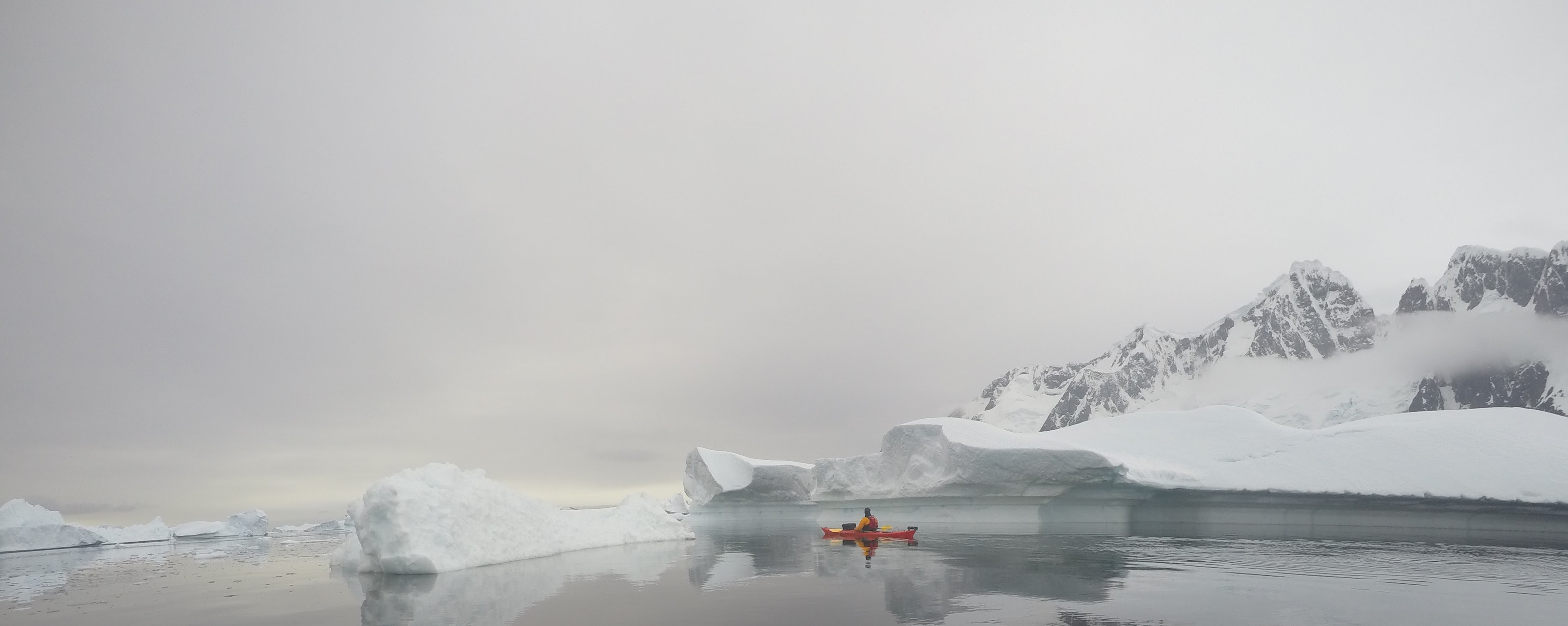 Kayaking amongst Antarctic icebergs