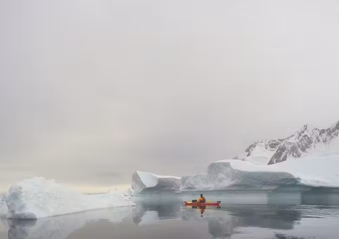 Kayaking amongst Antarctic icebergs
