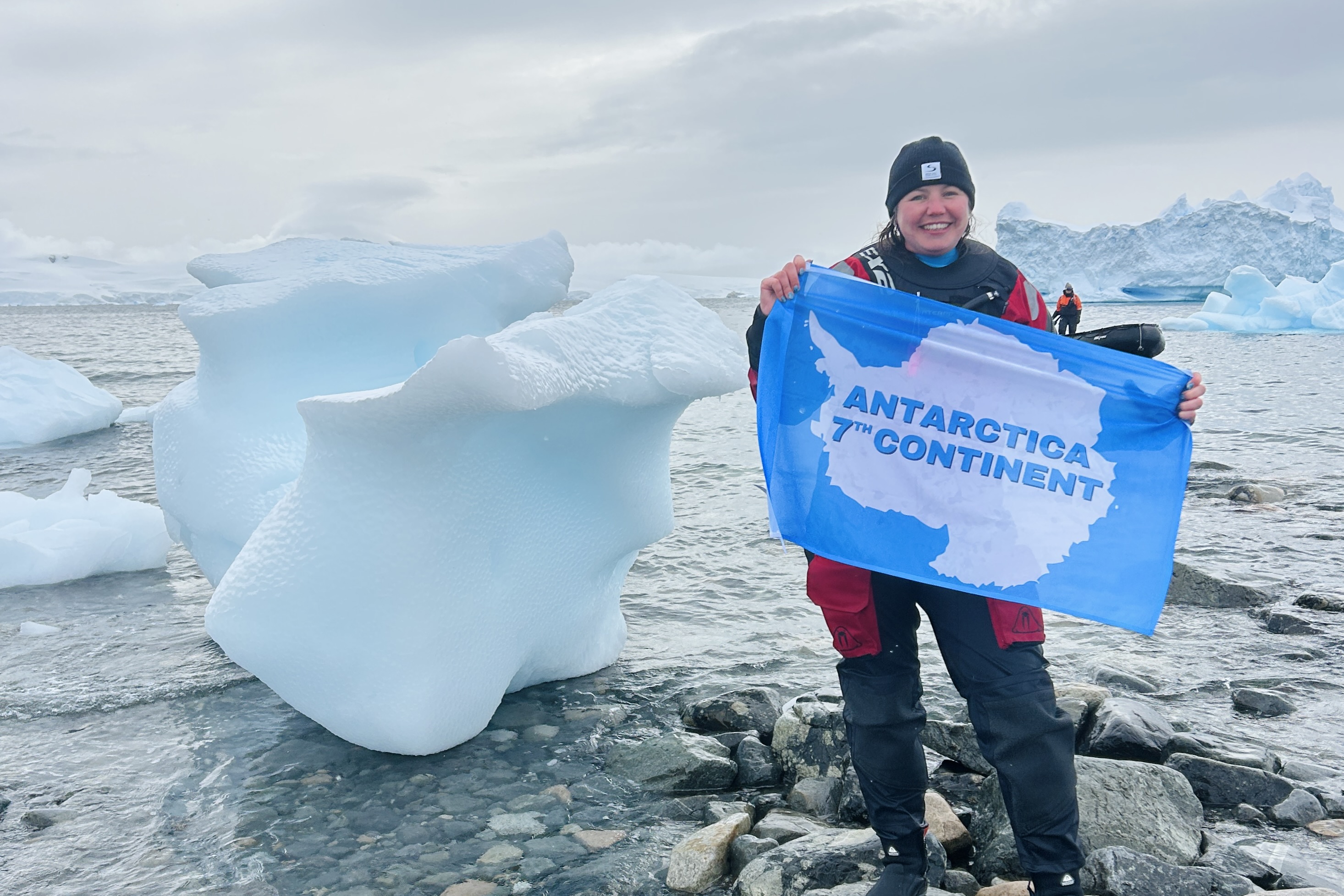 Sarah celebrating her visit to the 7th continent