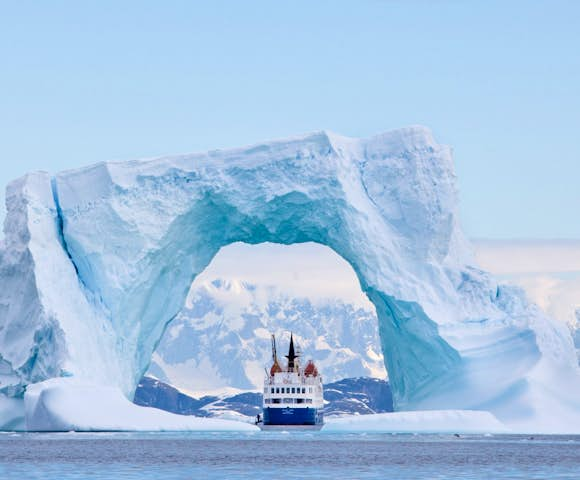 Ocean Nova, Antarctic Vessel amongst icebergs in Antarctica