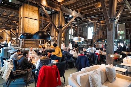 People eat and drink at Explorers House in Punta Arenas