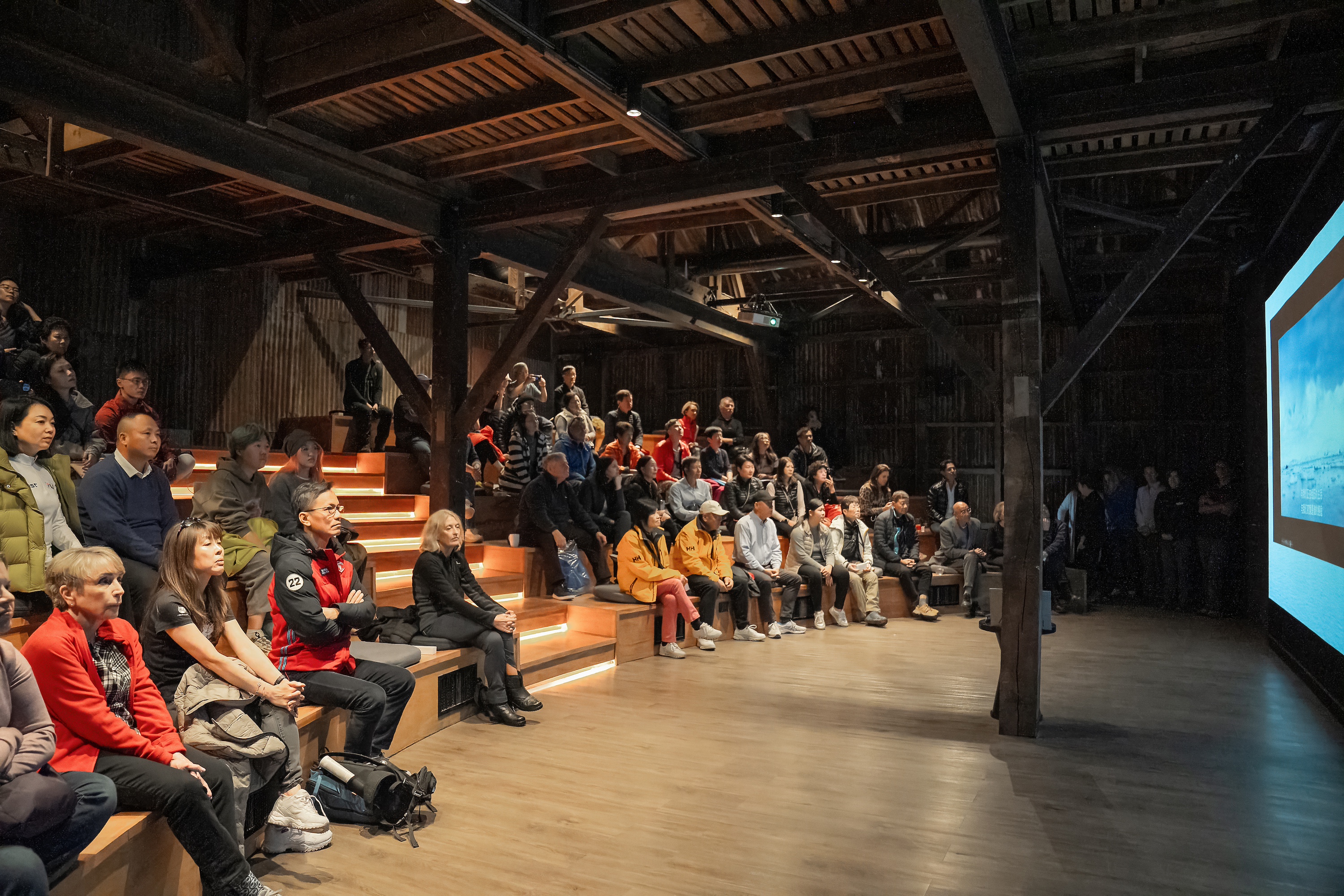 People gather to watch a lecture on Antarctica at Explorers House, Punta Arenas, Chile