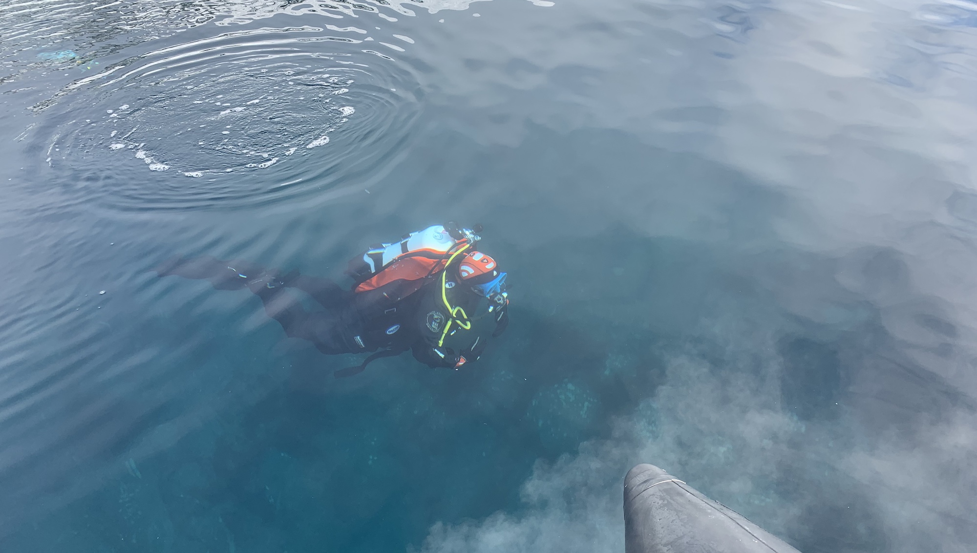 Scuba diving off a zodiac boat in Antarctica 