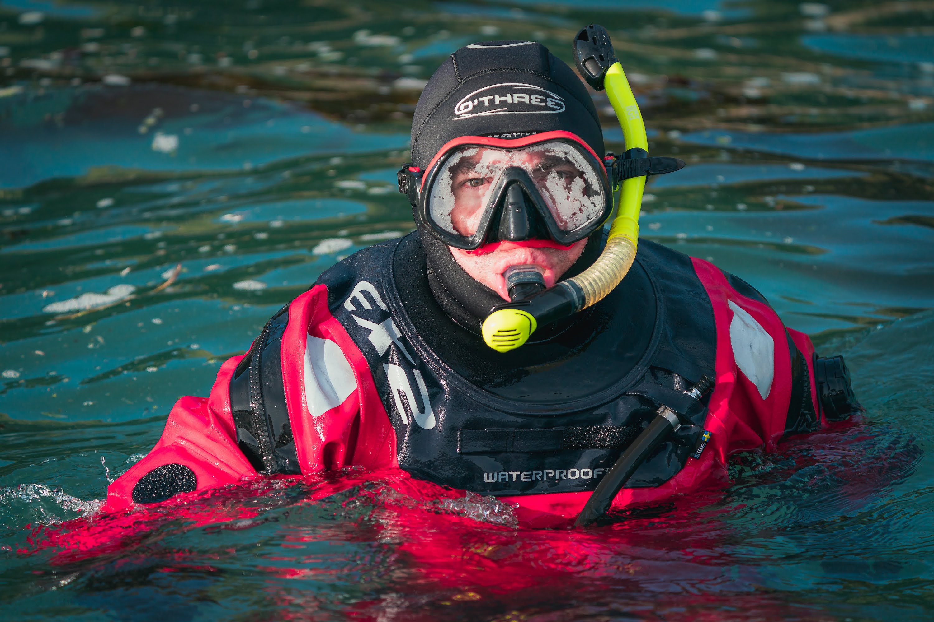A snorkeller comes up for air in the Antarctic