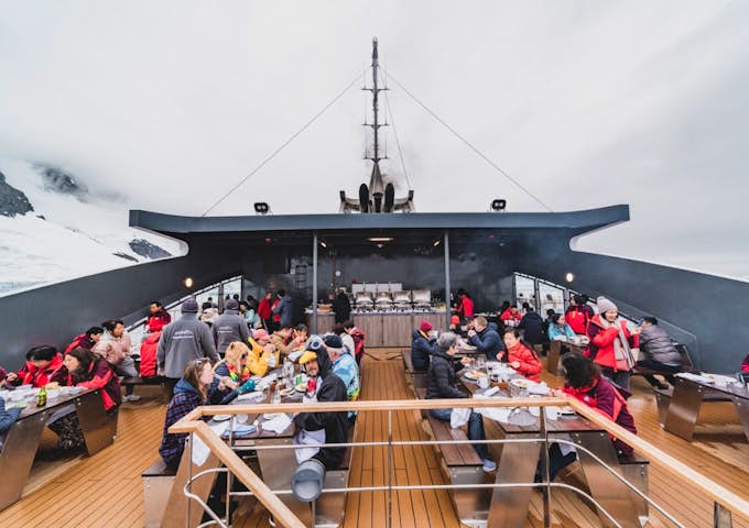 Lunch on deck of the Magellan Explorer, Antarctic expedition vessel in Antarctica