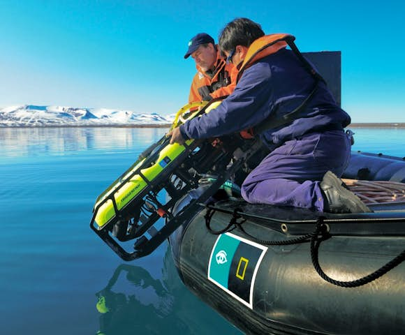 Launching the underwater camera from the Zodiac, NG Explorer, Antarctica