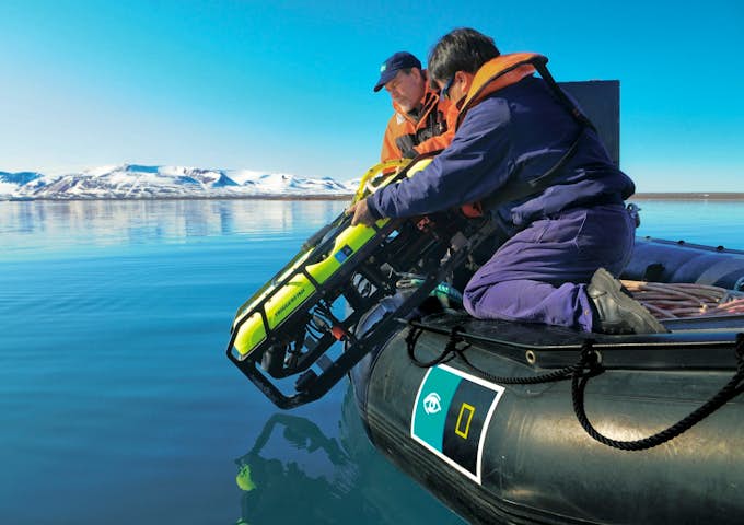 Launching the underwater camera from the Zodiac, NG Explorer, Antarctica