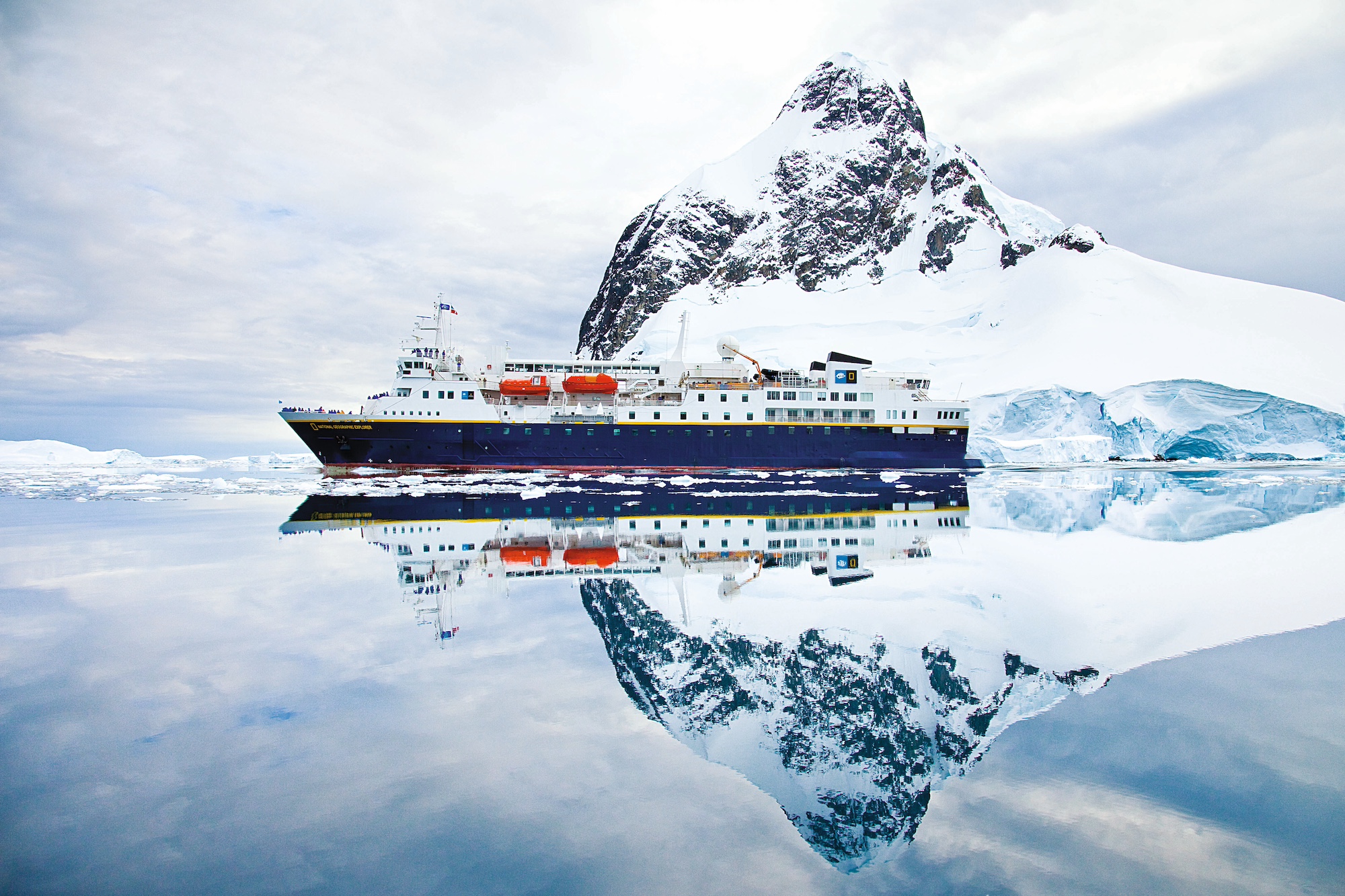 The National Geographic ship glides through the Lemaire Channel in Antarctica 