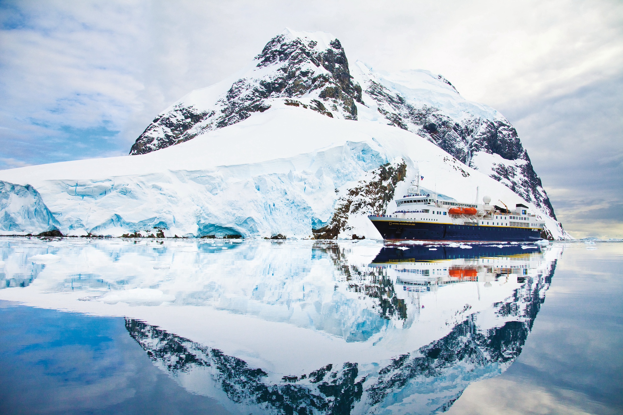 The National Geographic ship glides through the Lemaire Channel in Antarctica 