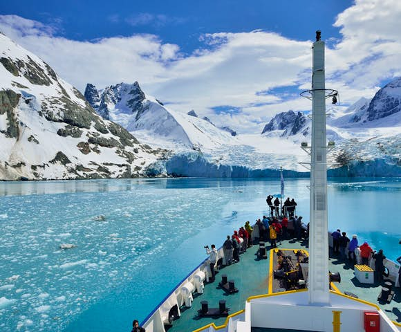 View from the bow of the Plancius ship as it approaches the Risting Glacier at the head of Dryglaski Fjord