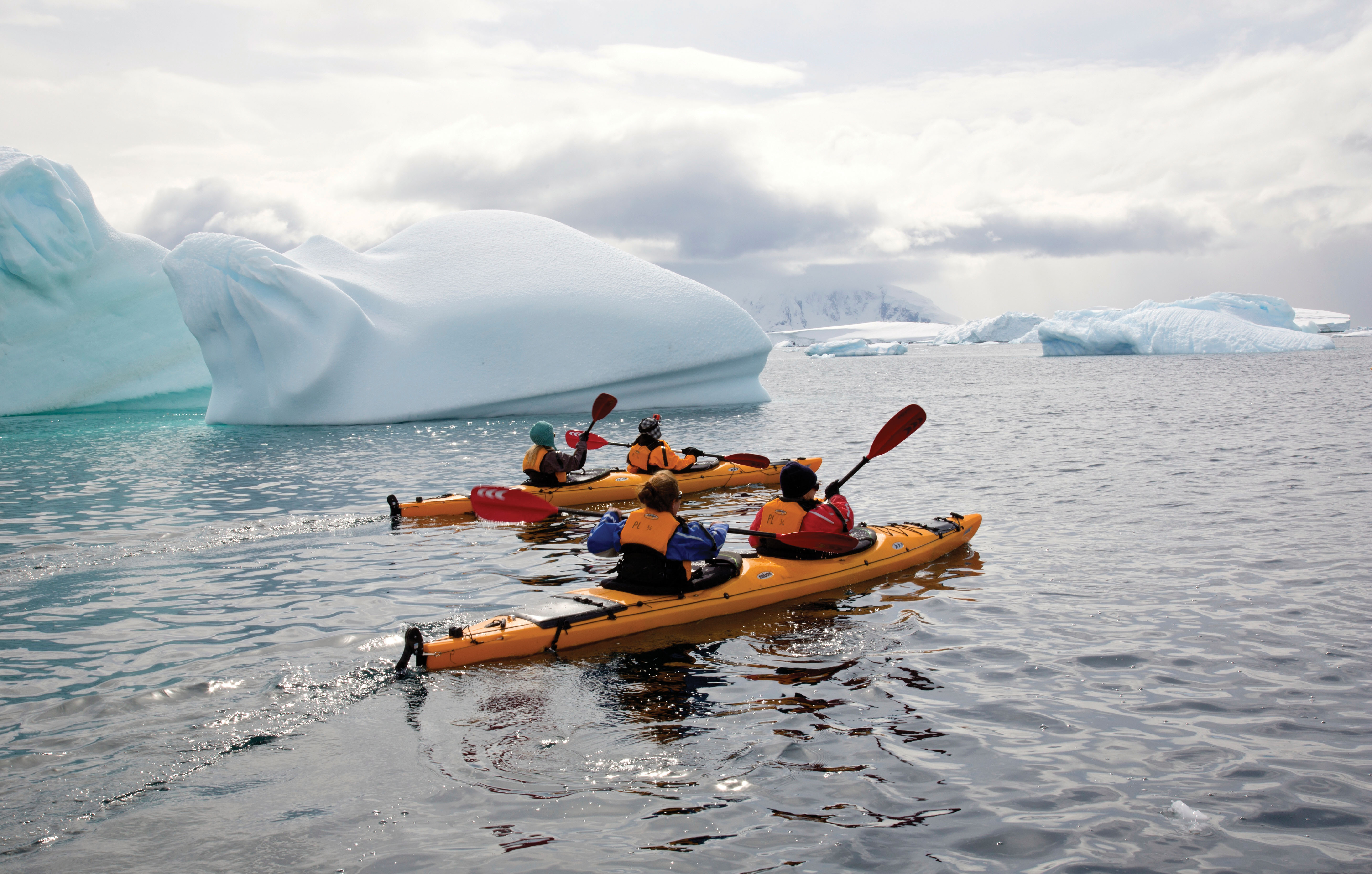 Kayak past the ice