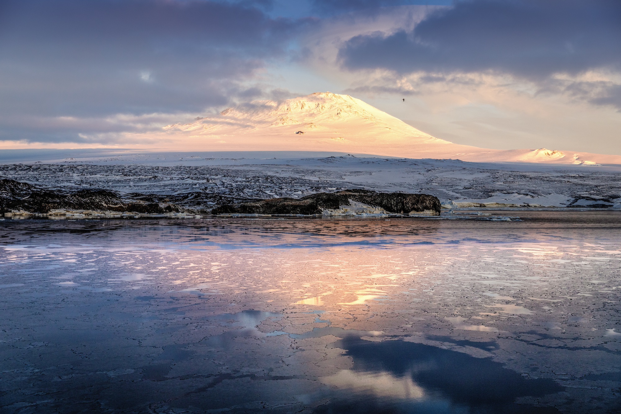 Sun hits Mount Erebus, Antarctica
