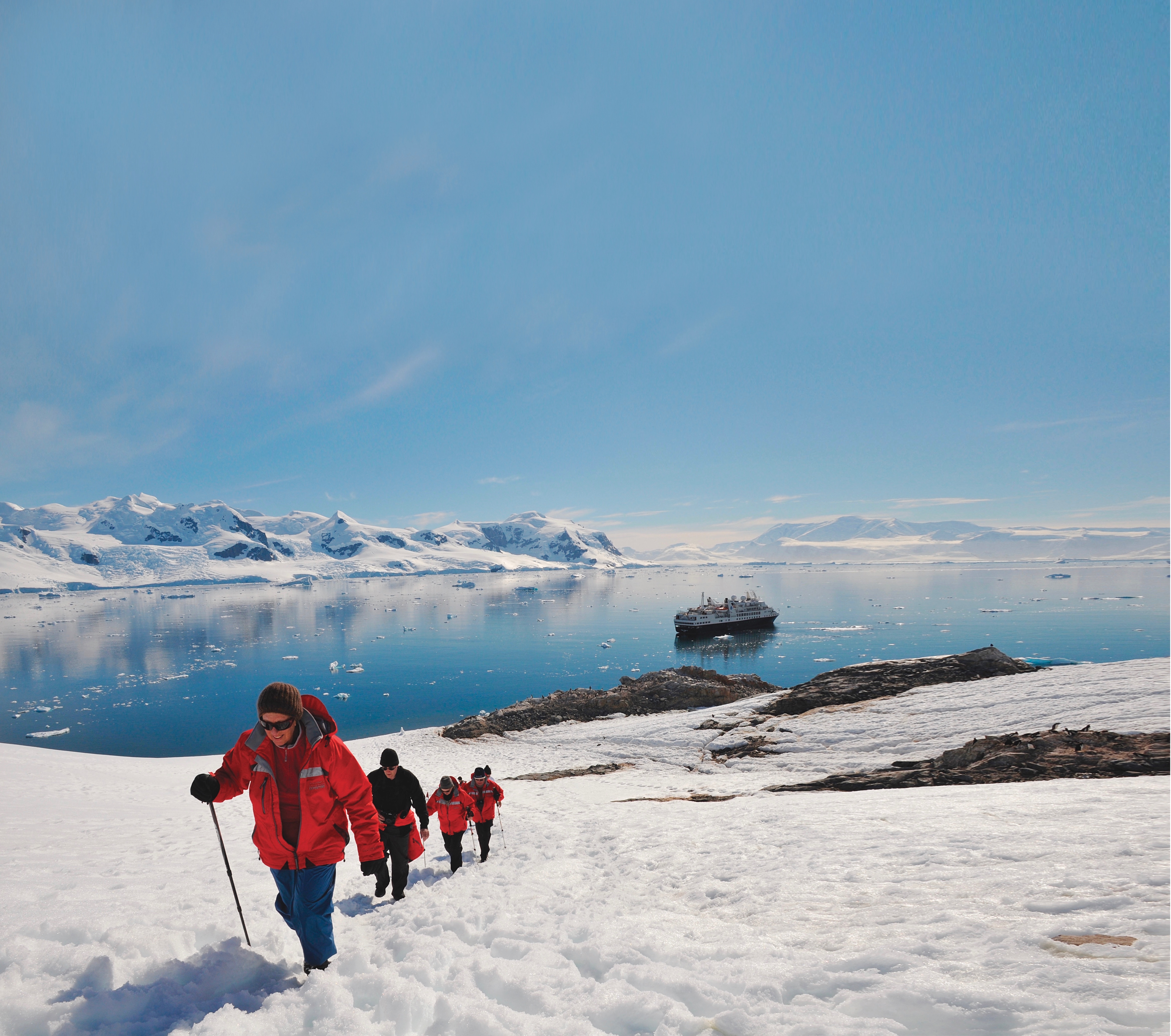 Hiking through the snow on the Antarctic Peninsula