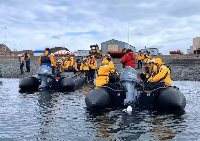 Zodiac transfer to your expedition ship at King George Island during a Fly & Cruise trip