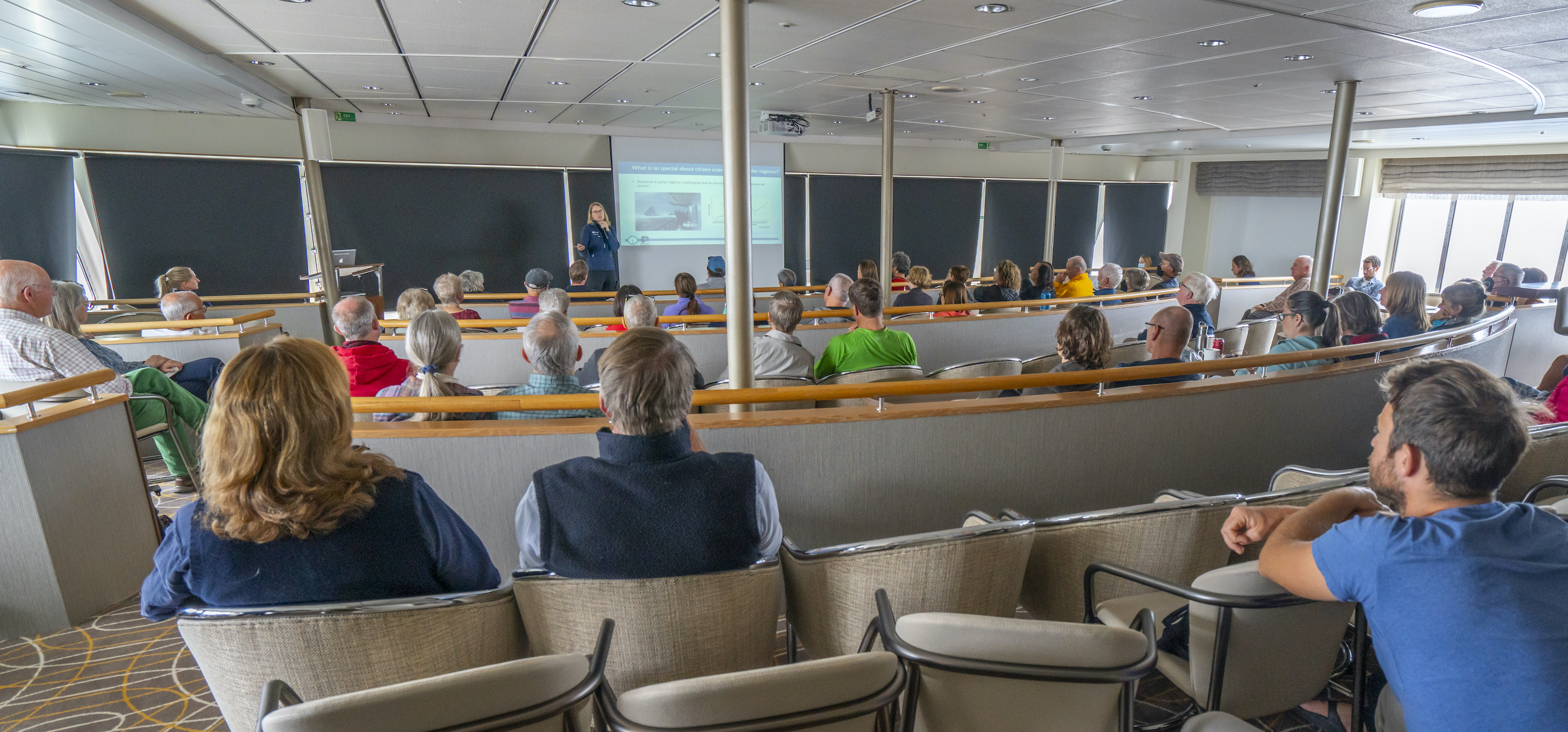 Onboard lecture by an Antarctic guide about citizen science