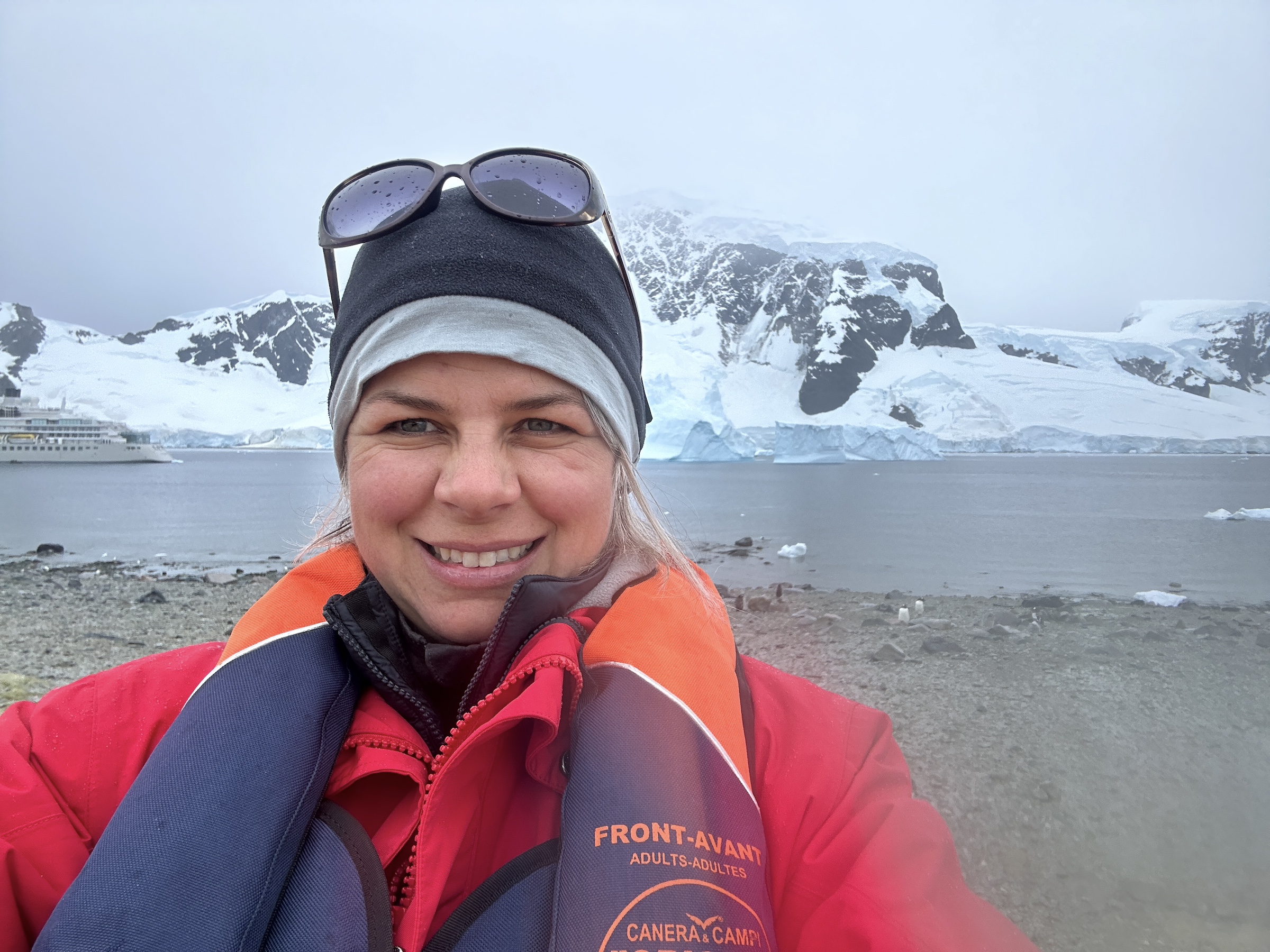 Cassia, a Swoop polar expert, poses for a selfie in Antarctica 