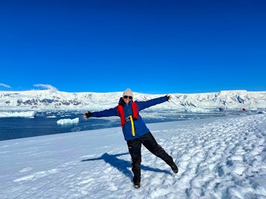 Cassia, a Swoop polar expert, poses in the snow