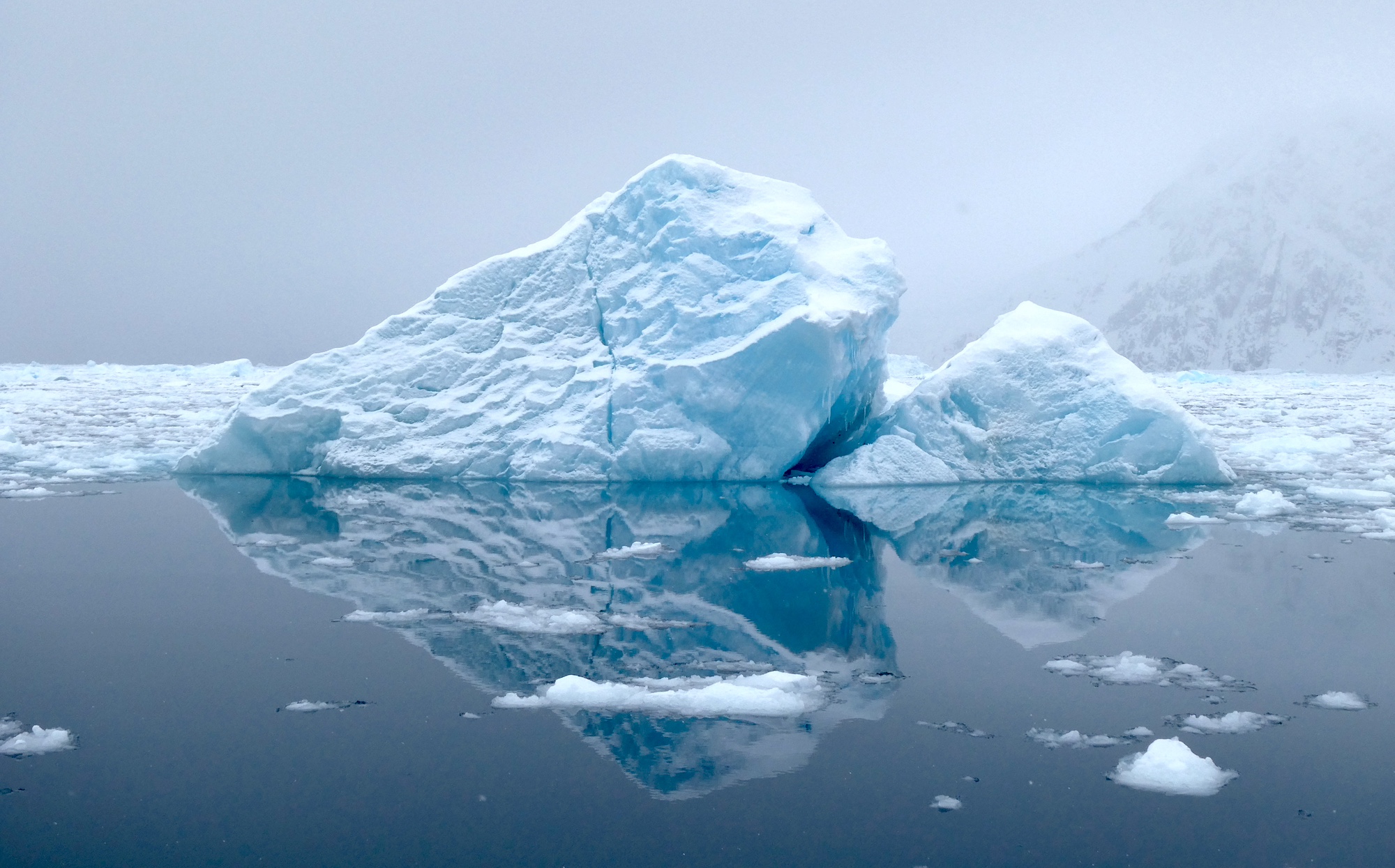A diamond iceberg reflects in Antarctic waters