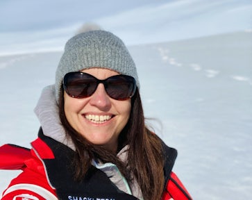 Louise from Swoop smiles while taking a selfie in Antarctica