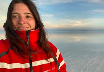 A woman takes a selfie in Antarctica