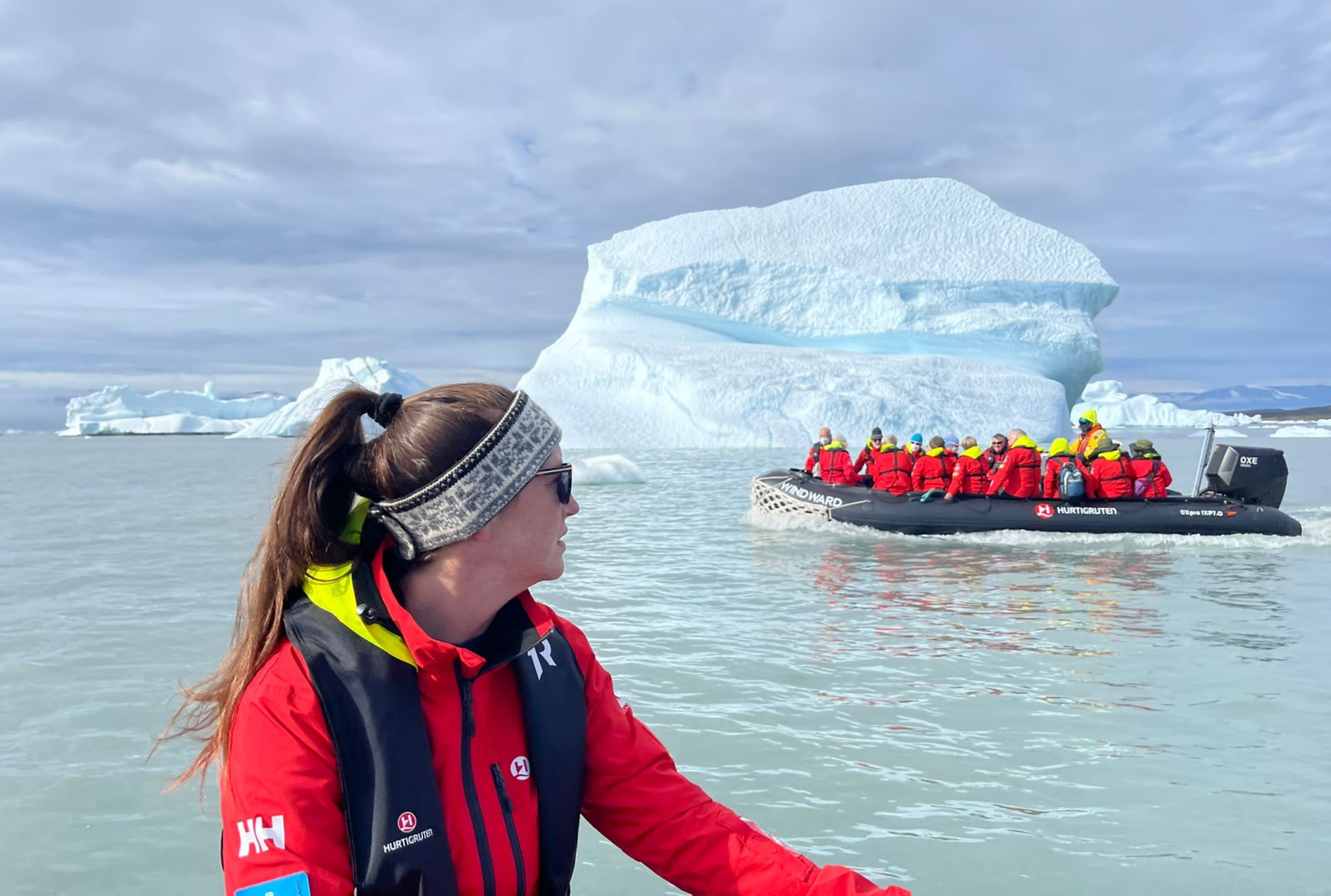A woman explores Antarctica in a Zodiac boat 