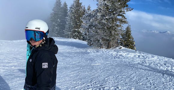 A woman snowboards in France
