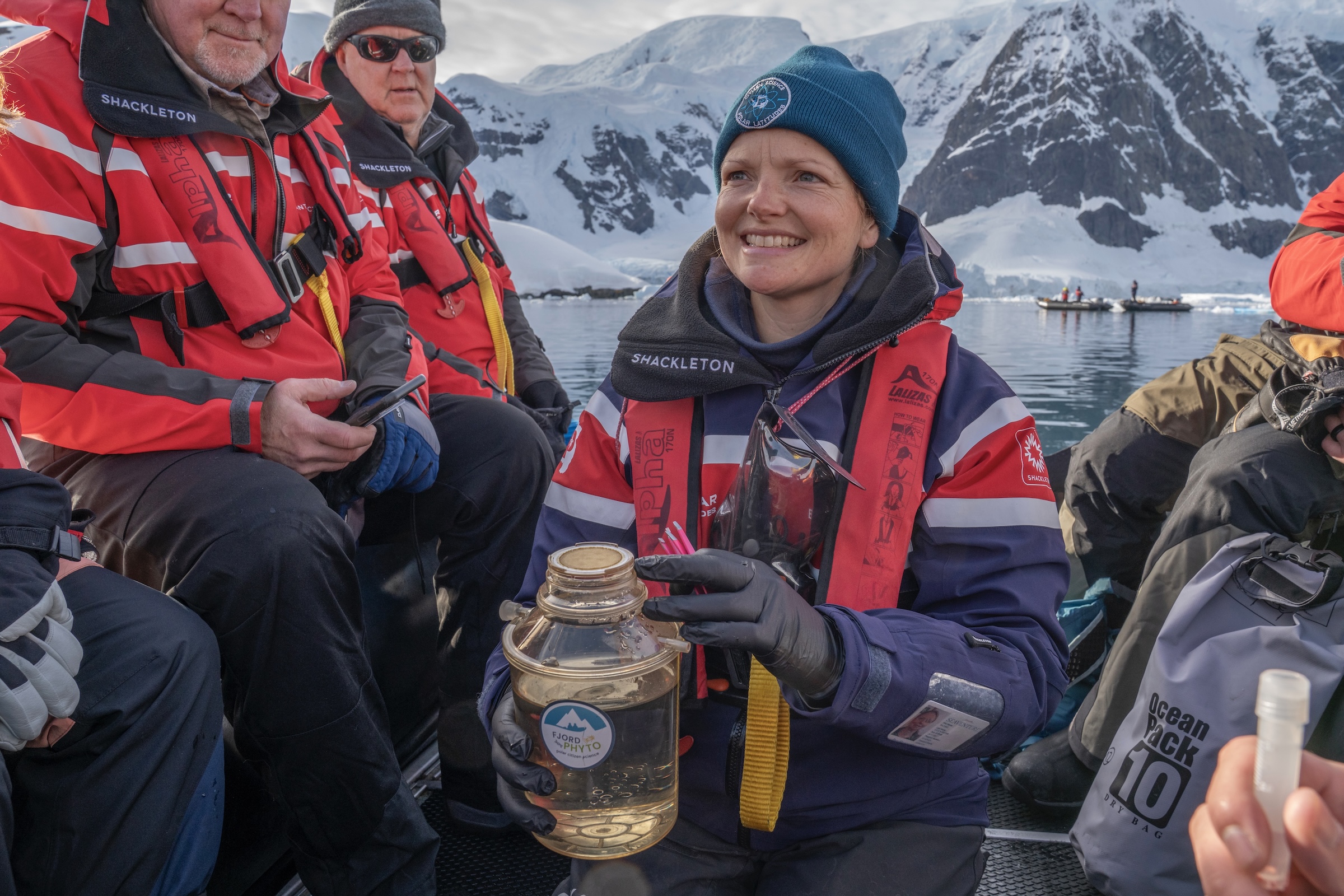 A polar guide demonstrating the FjordPhyto ctizen science project in Antarctica