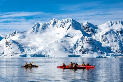 Kayakers at Pleneau Island on the Antarctic Peninsula
