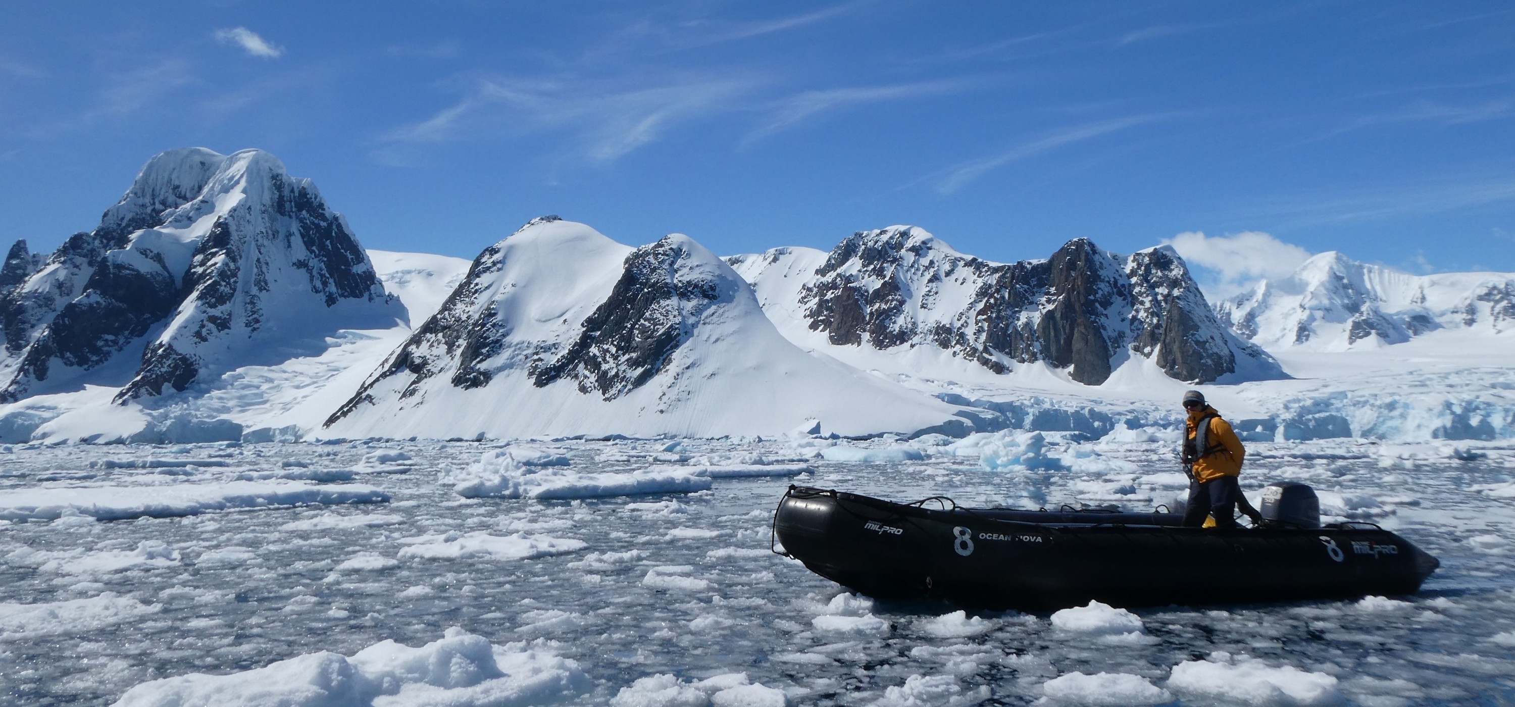 A guide in a zodiac about to take passengers through the brash ice