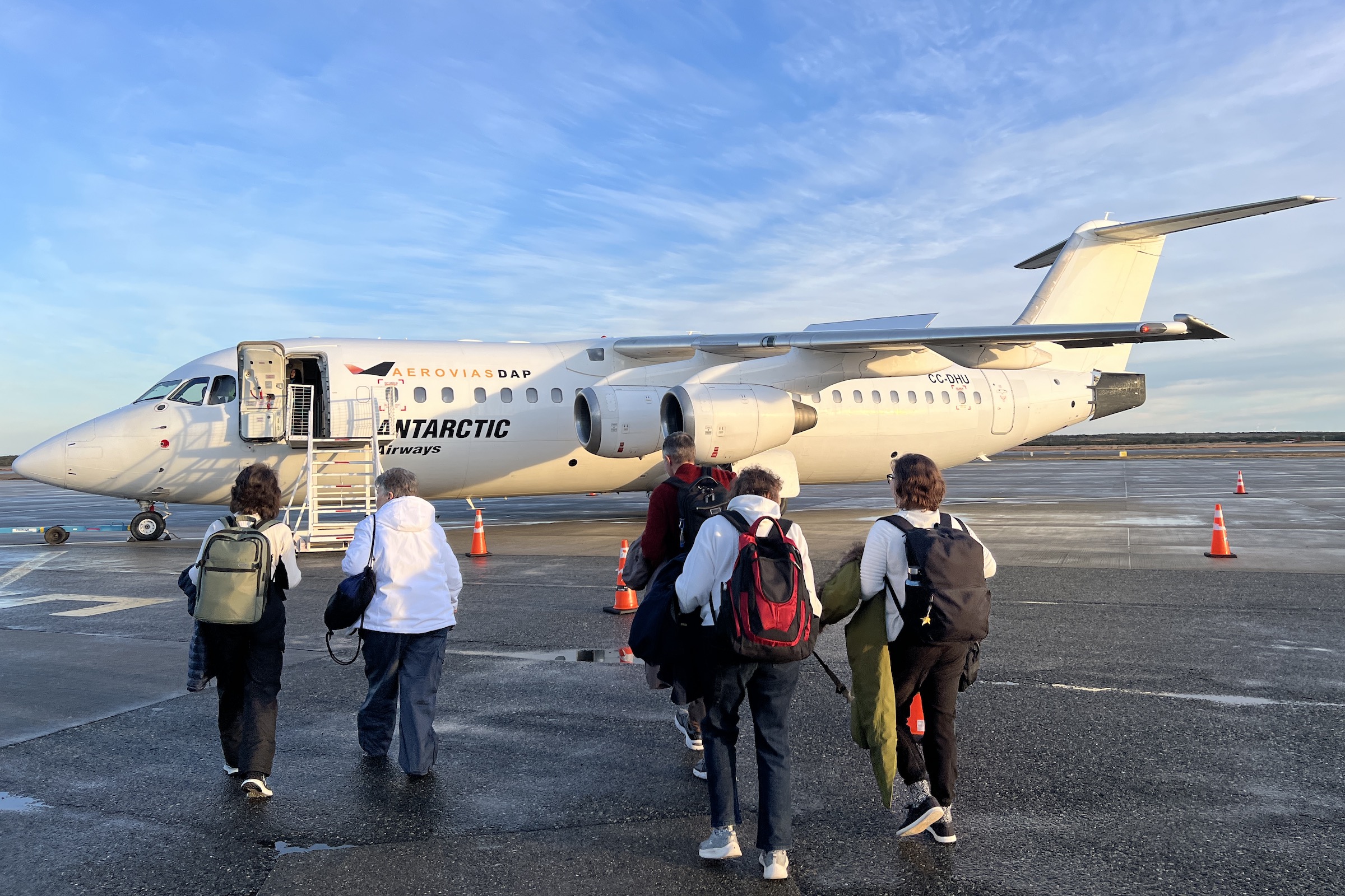 Passengers boarding an Antarctic Airways flight a fly-cruise Antarctica trip