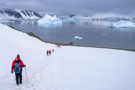 Walking in the snow at Danco Bay in Antarctica