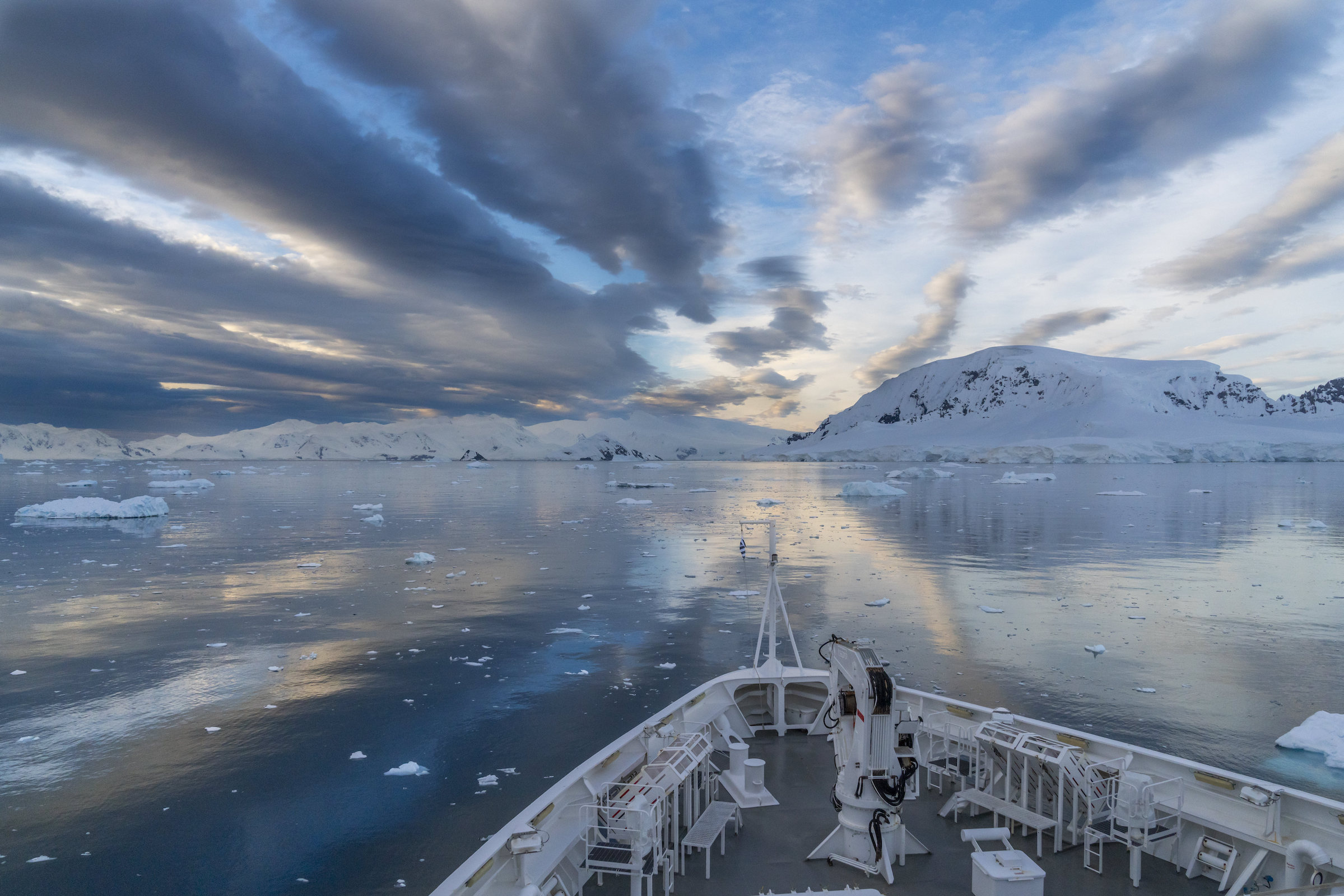 Antarctic coastline perfect reflection from cruise ship