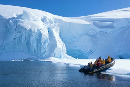 Zodiac landing on ice in Antarctica