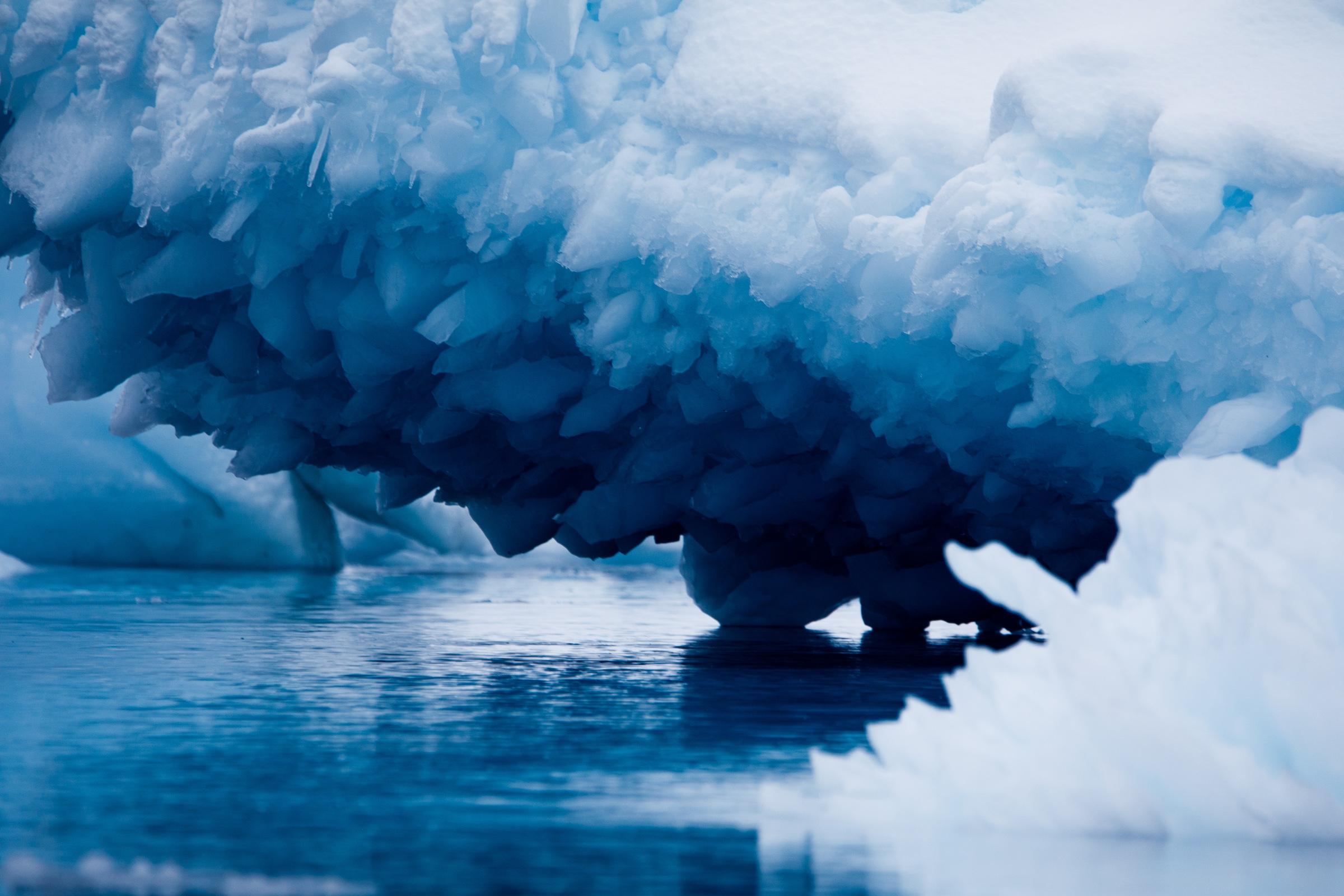 The myriad blue hues of an iceberg in Antarctica