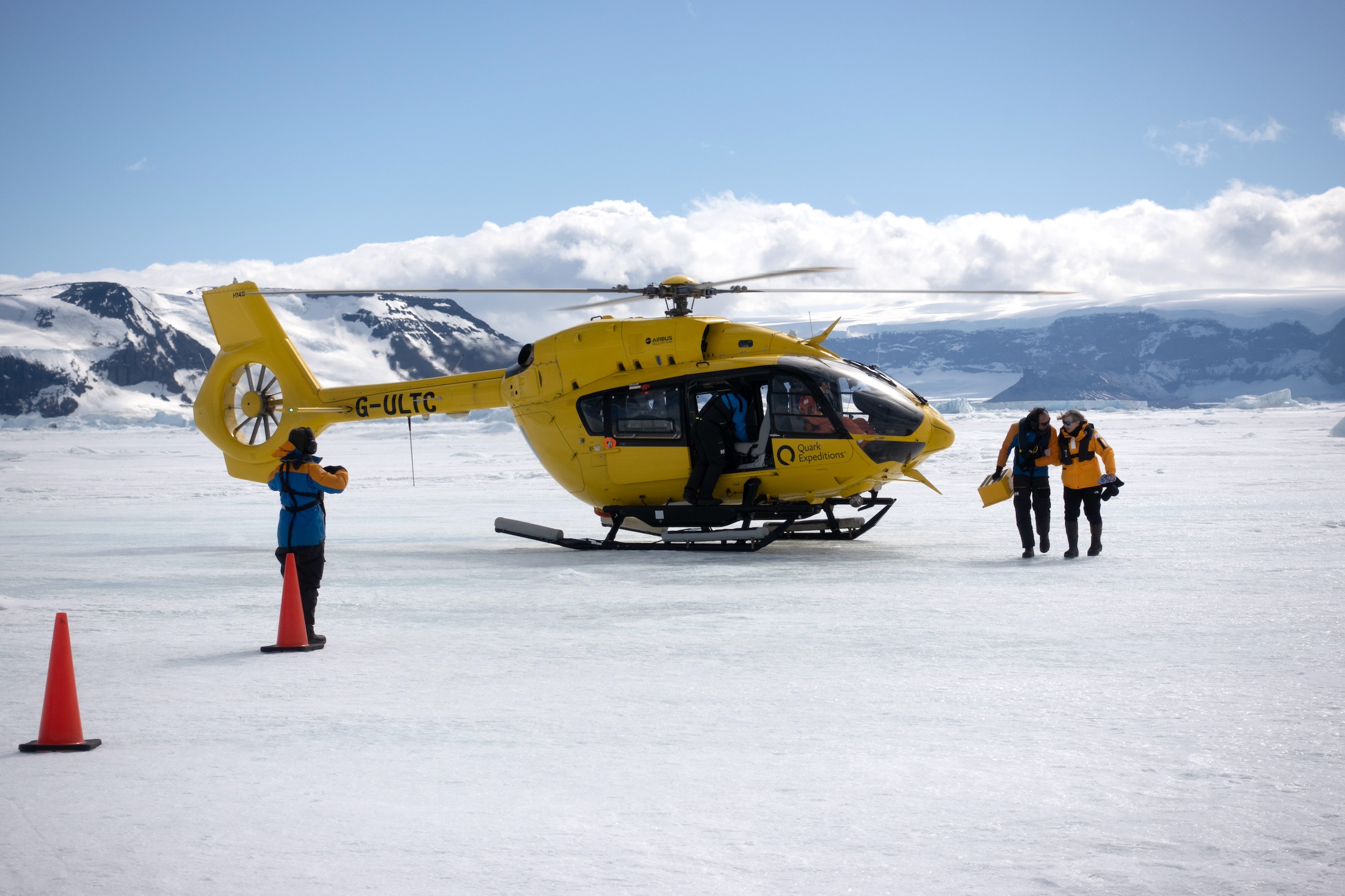 A helicopter waits for passengers in Antarctica