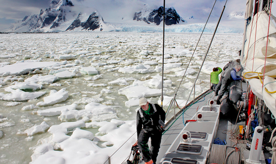 Deck view of a yacht sailing through brash ice in the Southern Ocean
