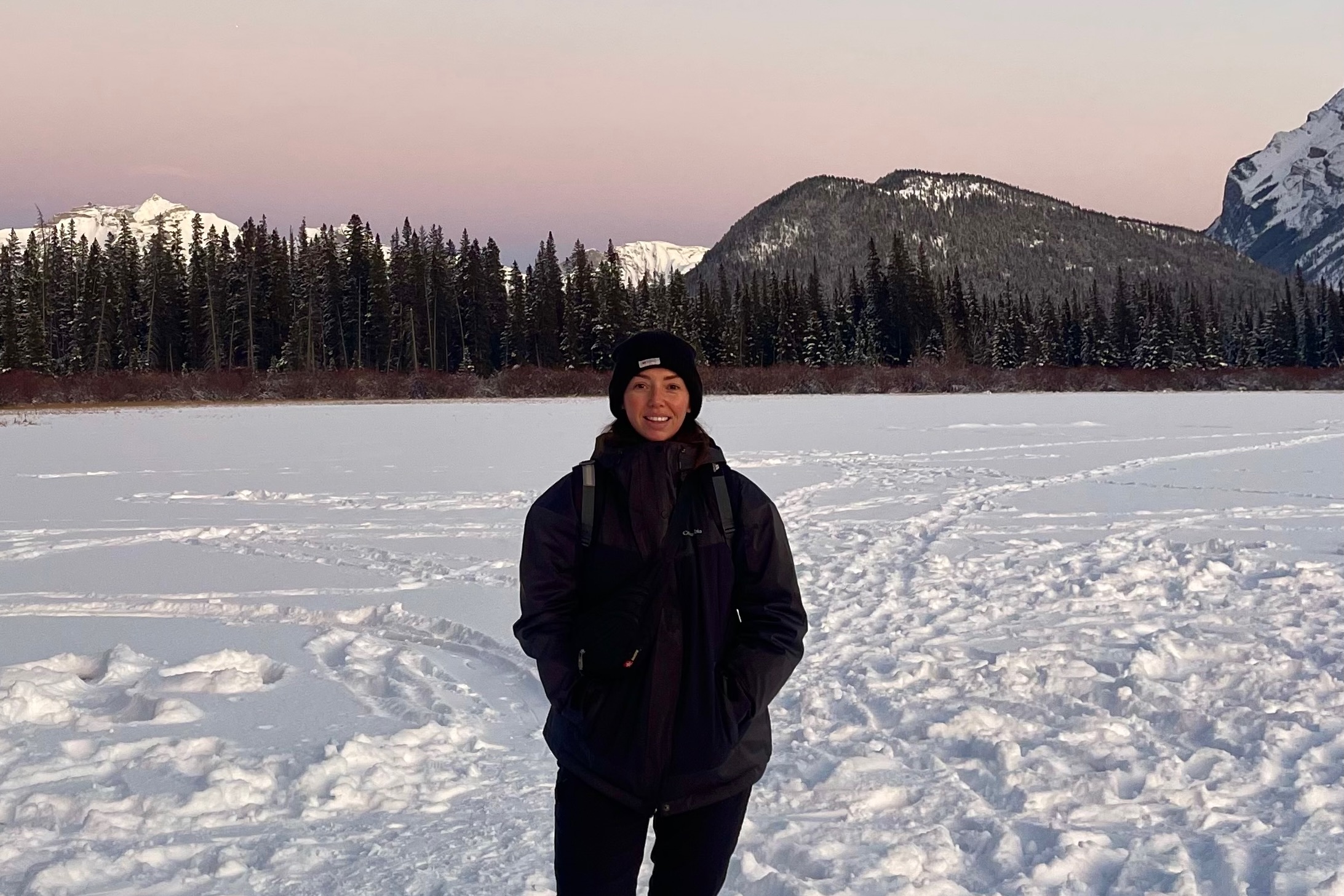Jade standing on the frozen Vermillion Lake, Banff National Park