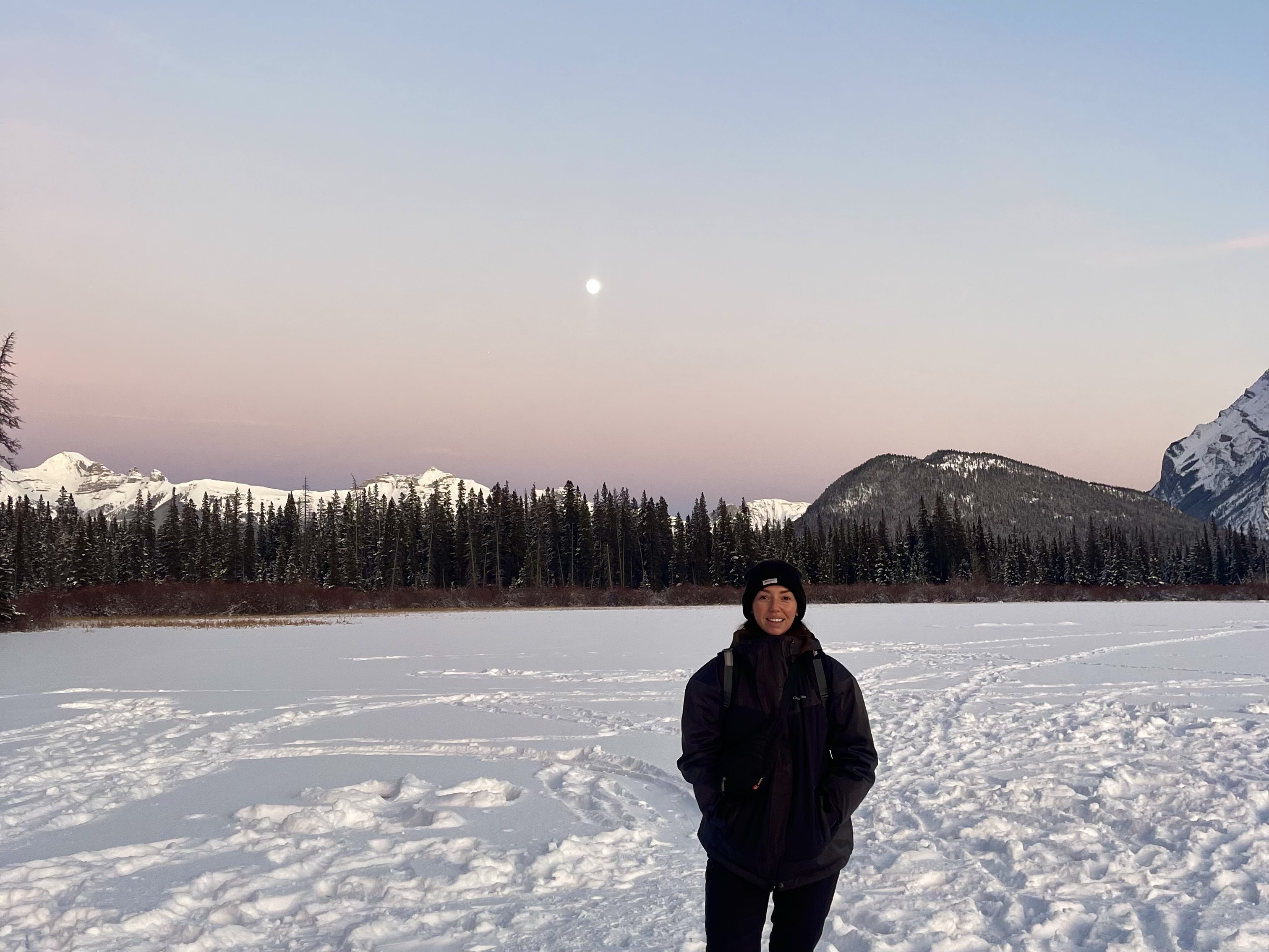 Jade standing on the frozen Vermillion Lake, Banff National Park