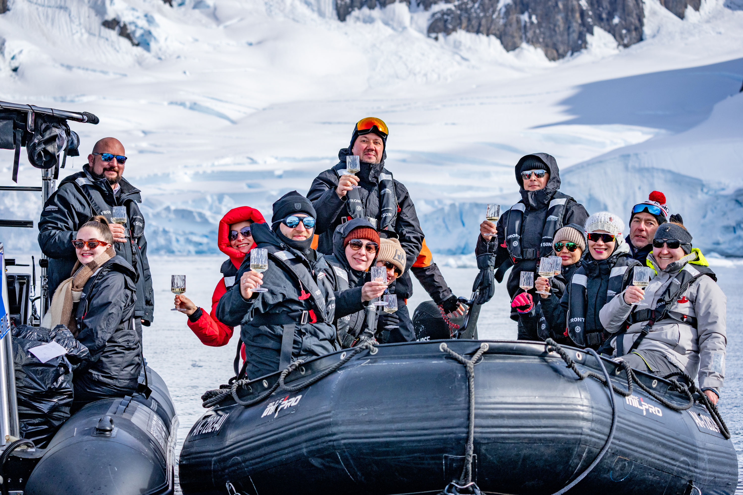 Champagne reception onboard a zodiac at Charlotte Bay