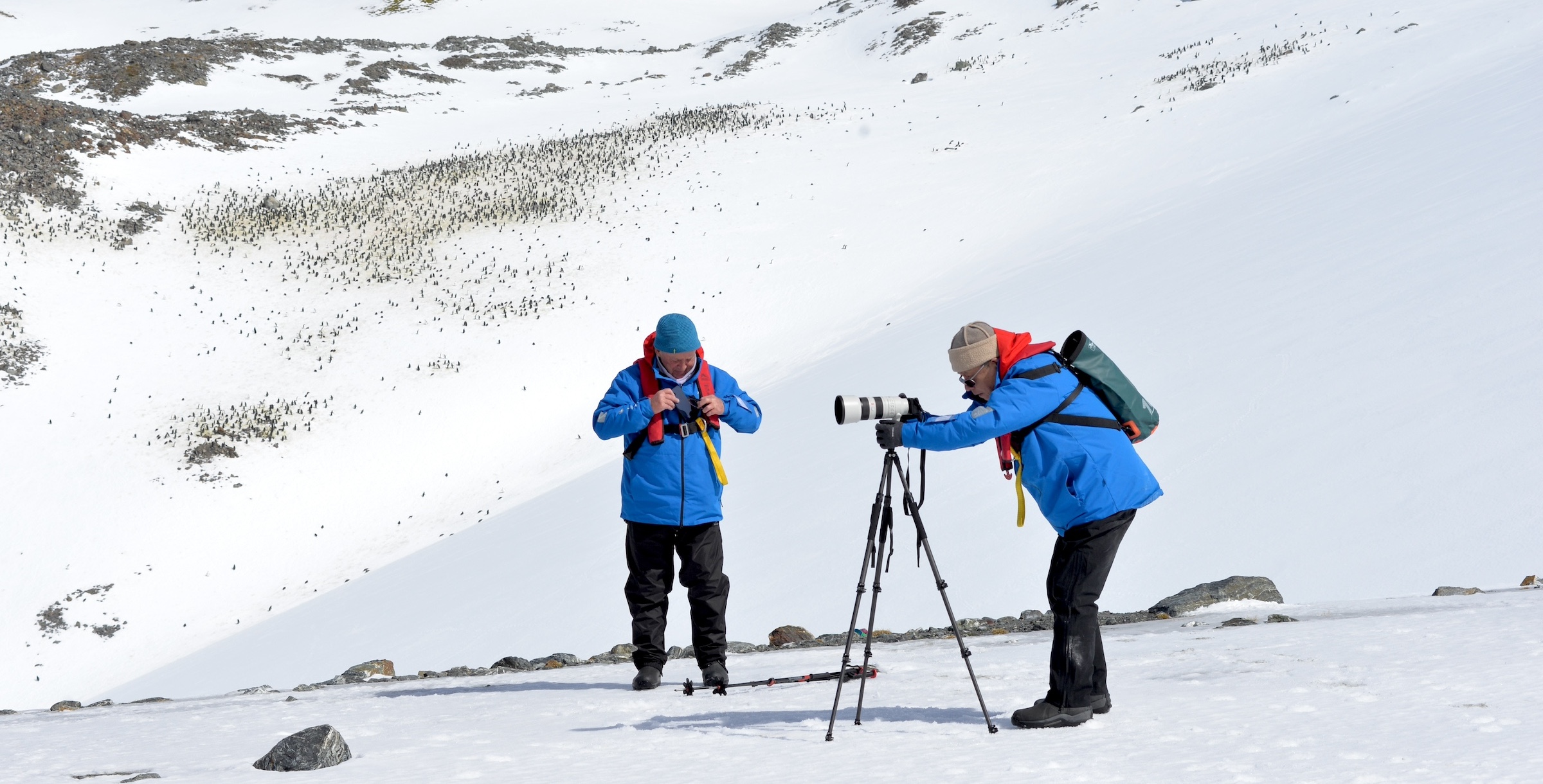 Guests use a tripod to capture Antarctic scenery 