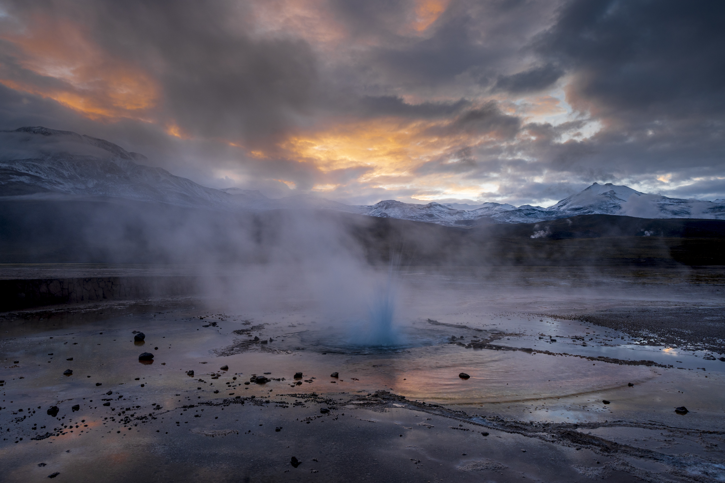 El Tatio Geysers erupting as sun rises